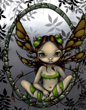 hazel fairy has a big-eyed fairy in dull green colors sitting on a stony oval ring