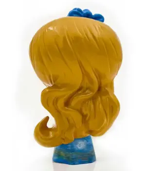 Alice in Van Gogh Starry night vinyl doll of Alice holding a painter's palette with Starry Night dress back side