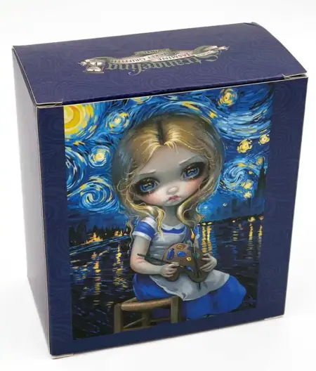 Alice in Van Gogh Starry night vinyl doll of Alice holding a painter's palette with Starry Night dress back of the box